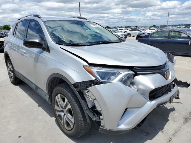 TOYOTA RAV4 LE 2018 with VIN 2T3ZFREV0JW514734 - Photo from auction