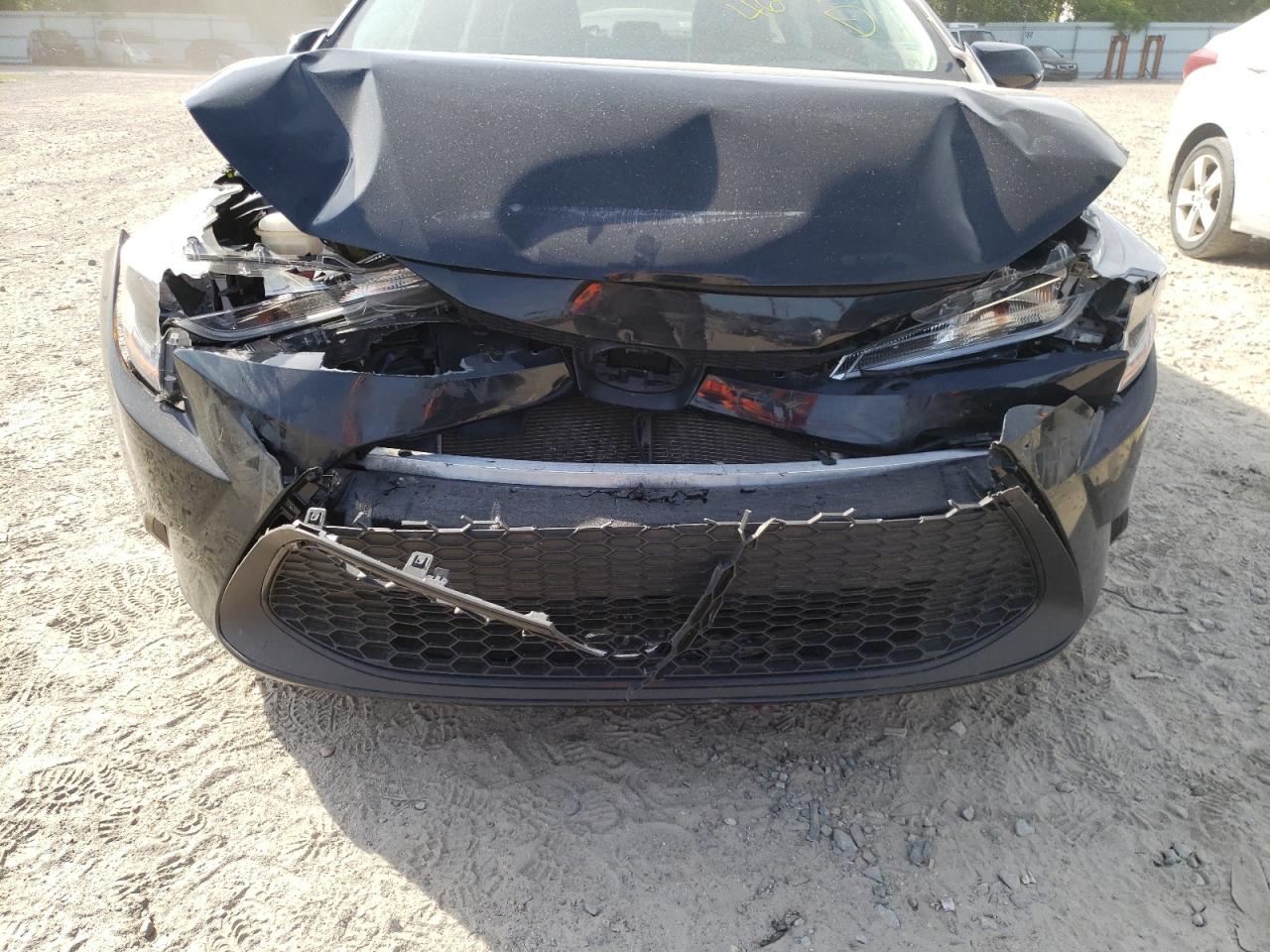 Photo 18 from auction – 2021 TOYOTA COROLLA LE with VIN 5YFEPMAE2MP169094