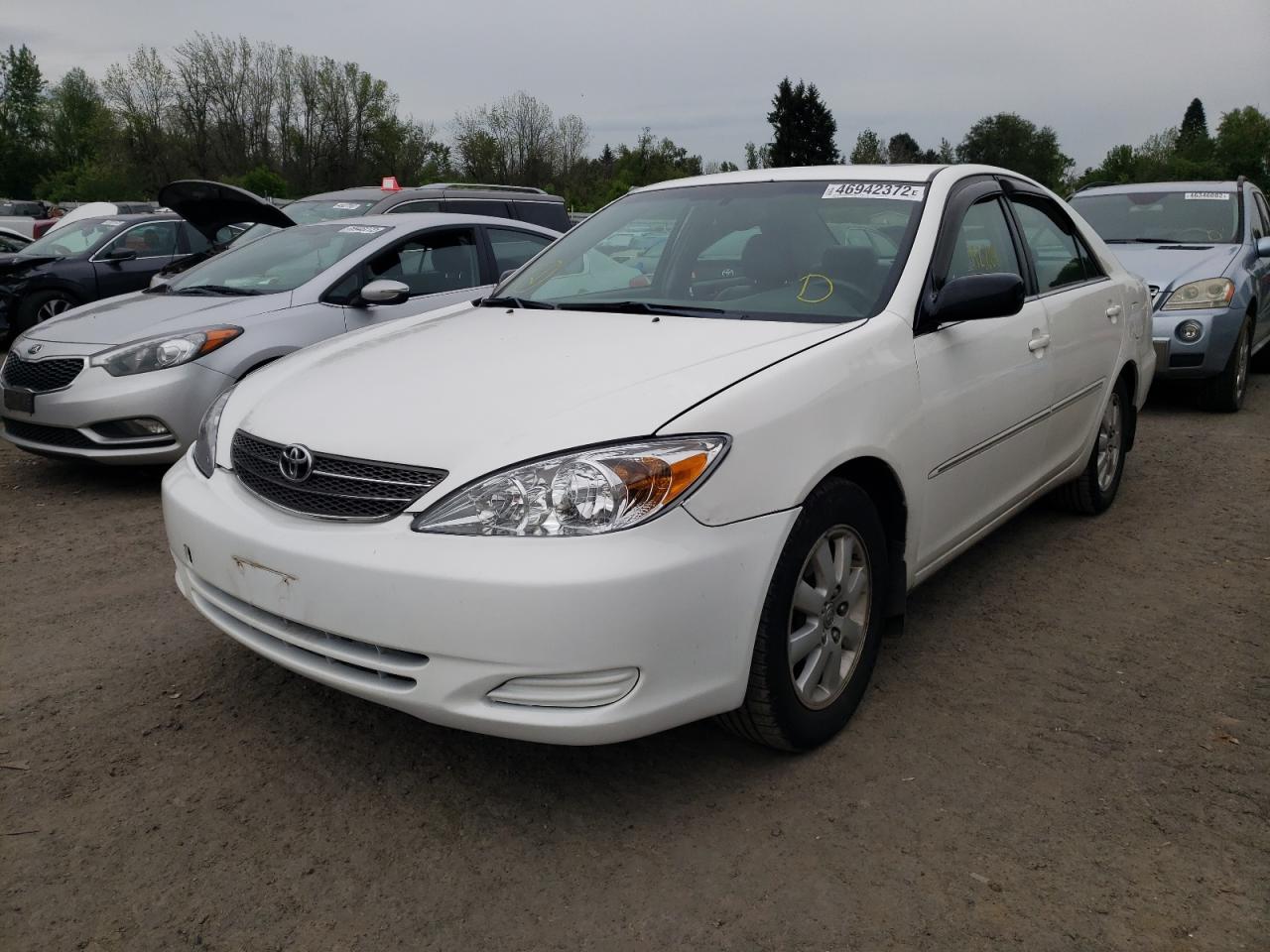 Photo 15 from auction – 2003 TOYOTA CAMRY LE with VIN 4T1BE30K23U196755