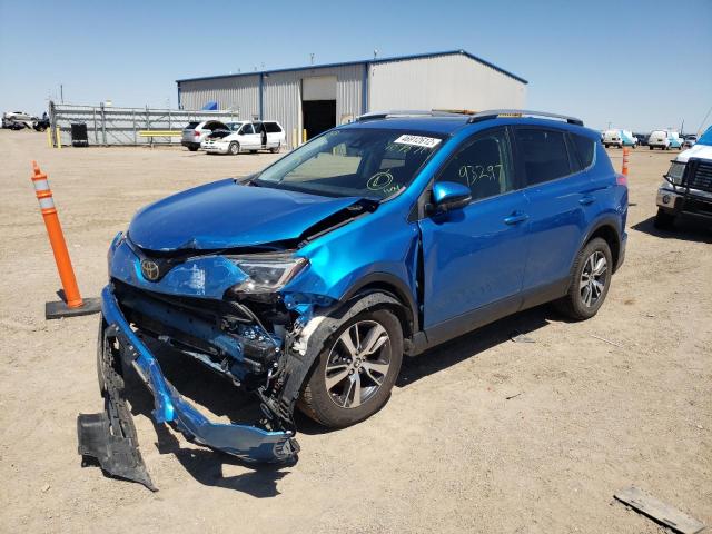 Photo 2 from auction – 2017 TOYOTA RAV4 XLE with VIN JTMWFREV8HJ107871