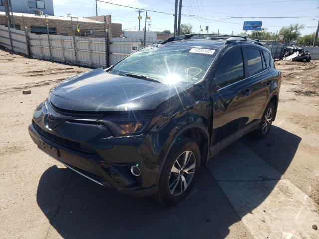 Photo 2 from auction – 2016 TOYOTA RAV4 XLE with VIN 2T3RFREV9GW465414