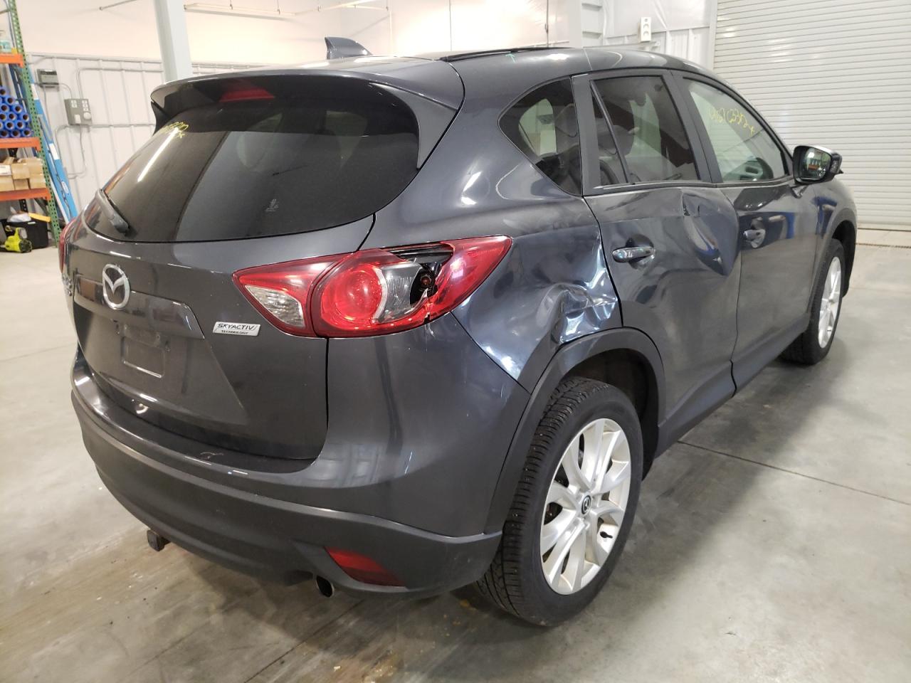 Photo 4 from auction – 2014 MAZDA CX-5 GT with VIN JM3KE4DY6E0348904