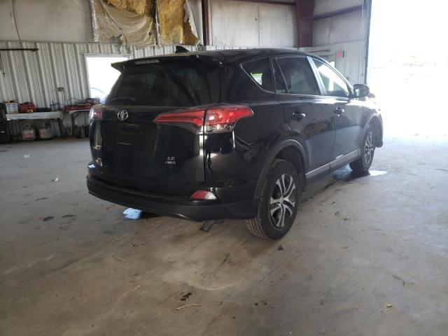 Photo 4 from auction – 2018 TOYOTA RAV4 LE with VIN 2T3BFREV8JW731756