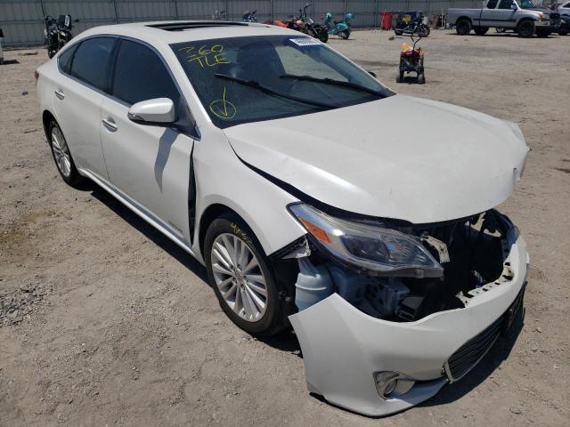 TOYOTA AVALON HYB 2014 with VIN 4T1BD1EB3EU026973 - Photo from auction