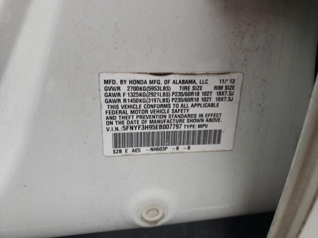 HONDA PILOT TOUR 2014 with VIN 5FNYF3H95EB007797 - Photo from auction