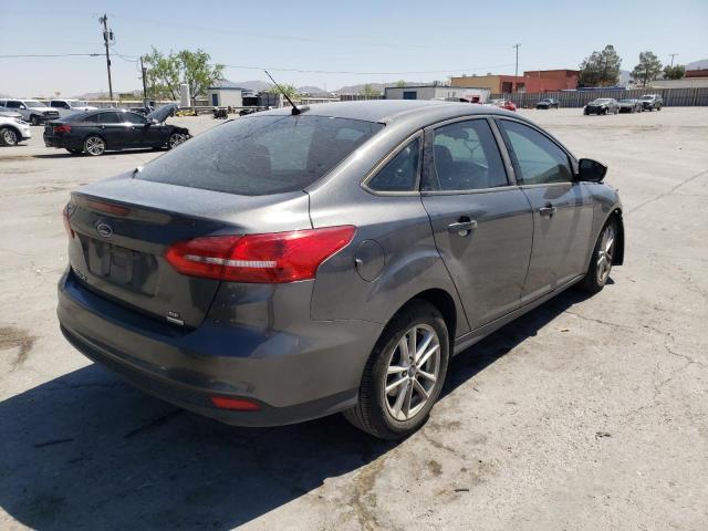 Foto 4 de la subasta – 2018 FORD FOCUS SE con VIN 1FADP3FE1JL311637