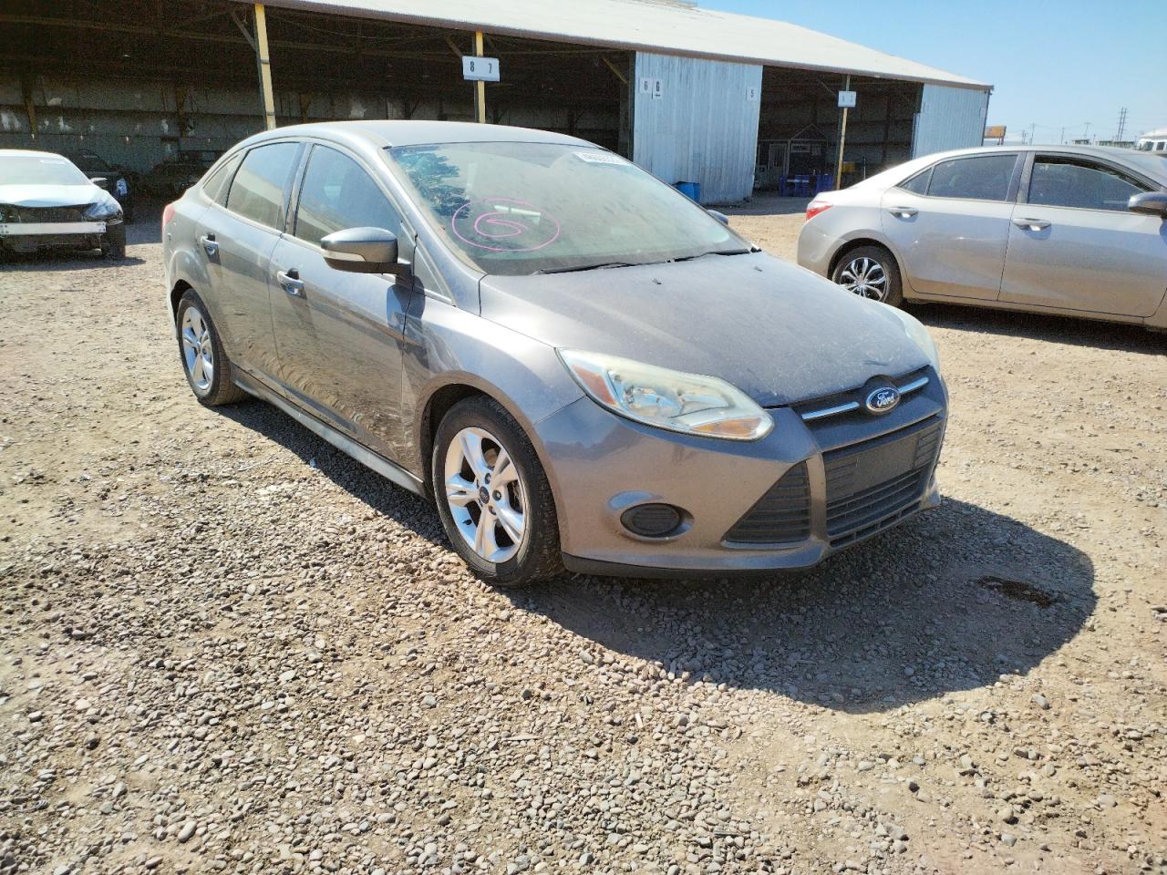 Photo 11 from auction – 2014 FORD FOCUS SE with VIN 1FADP3F2XEL355583