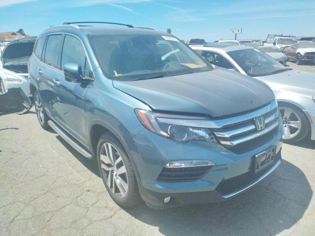 HONDA PILOT TOUR 2017 with VIN 5FNYF5H98HB015070 - Photo from auction