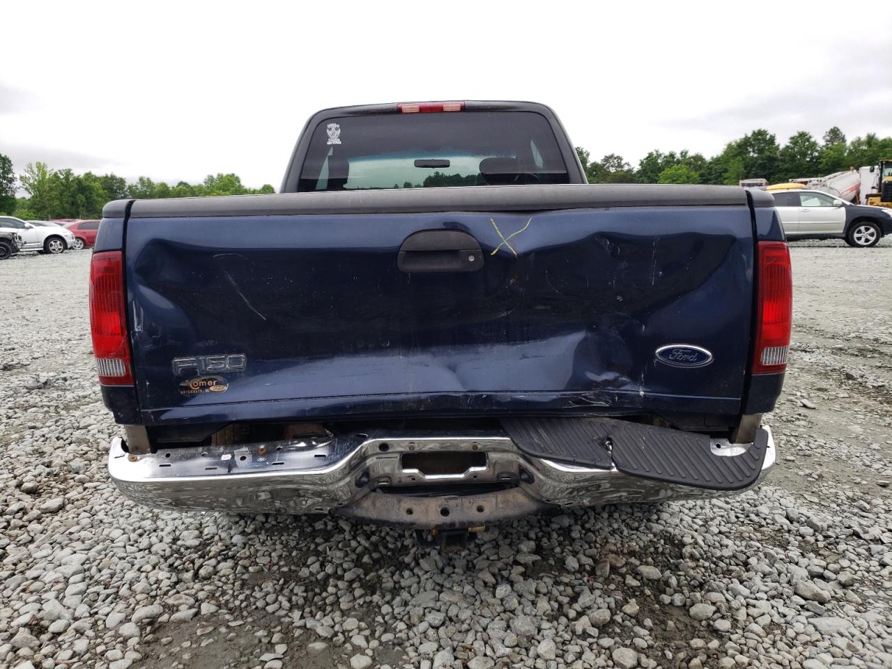 Photo 9 from auction – 2003 FORD F150 with VIN 1FTRX17203NA90953