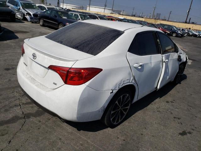 Photo 4 from auction – 2018 TOYOTA COROLLA L with VIN 5YFBURHEXJP763877