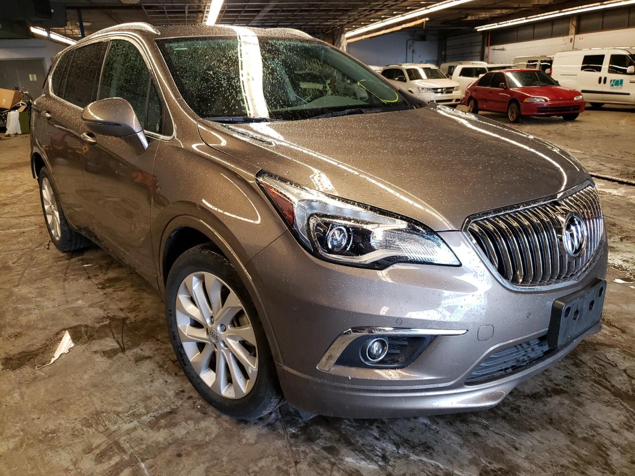 BUICK ENVISION P 2017 with VIN LRBFXFSX0HD054596 - Photo from auction