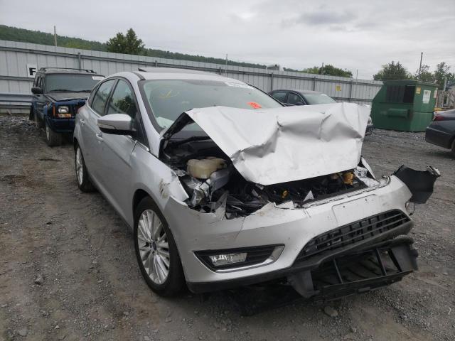 FORD FOCUS TITA 2017 with VIN 1FADP3N23HL203313 - Photo from auction