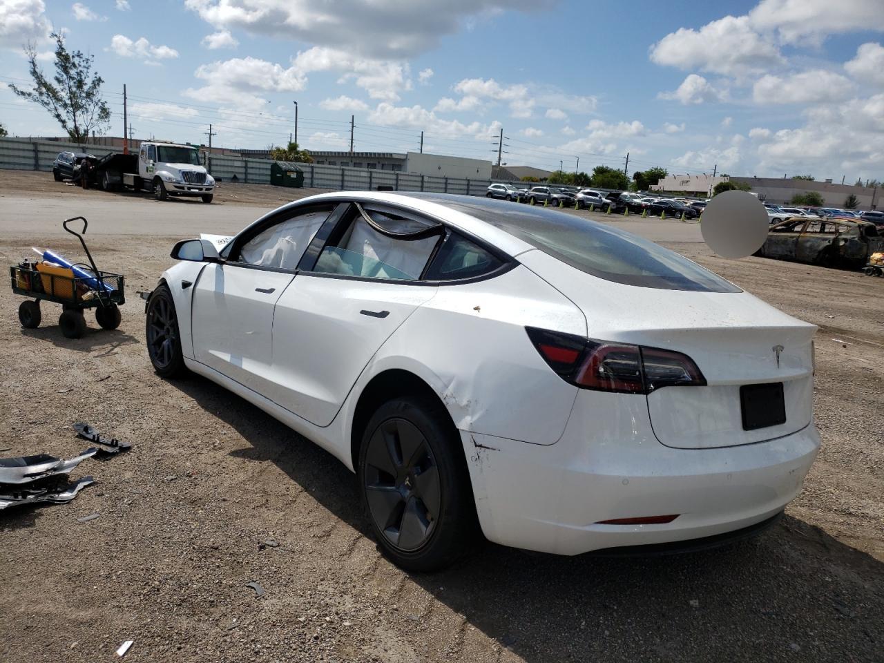 Photo 3 from auction – 2021 TESLA MODEL 3 with VIN 5YJ3E1EA4MF088290