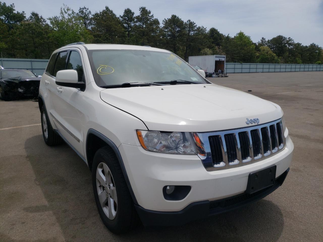 JEEP GRAND CHER 2011 with VIN 1J4RR4GG6BC701080 - Photo from auction