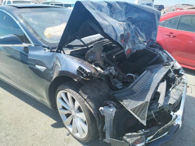 Photo 9 from auction – 2014 TESLA MODEL S with VIN 5YJSA1H10EFP51343
