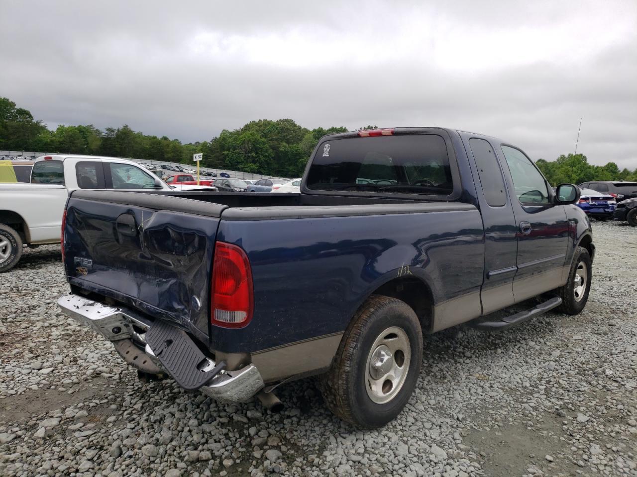 Photo 4 from auction – 2003 FORD F150 with VIN 1FTRX17203NA90953
