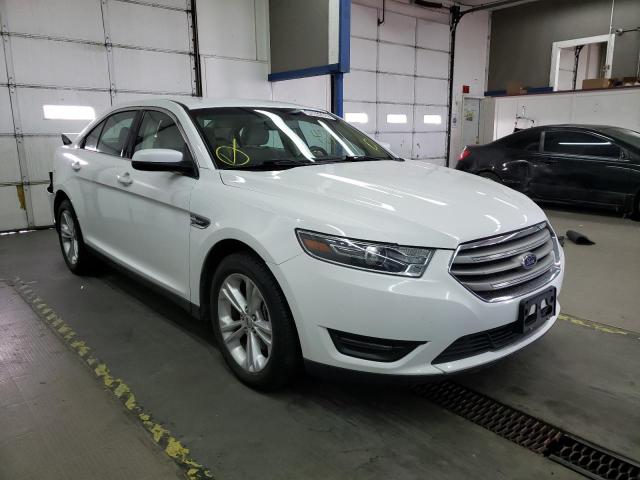 FORD TAURUS SEL 2017 with VIN 1FAHP2E84HG137783 - Photo from auction
