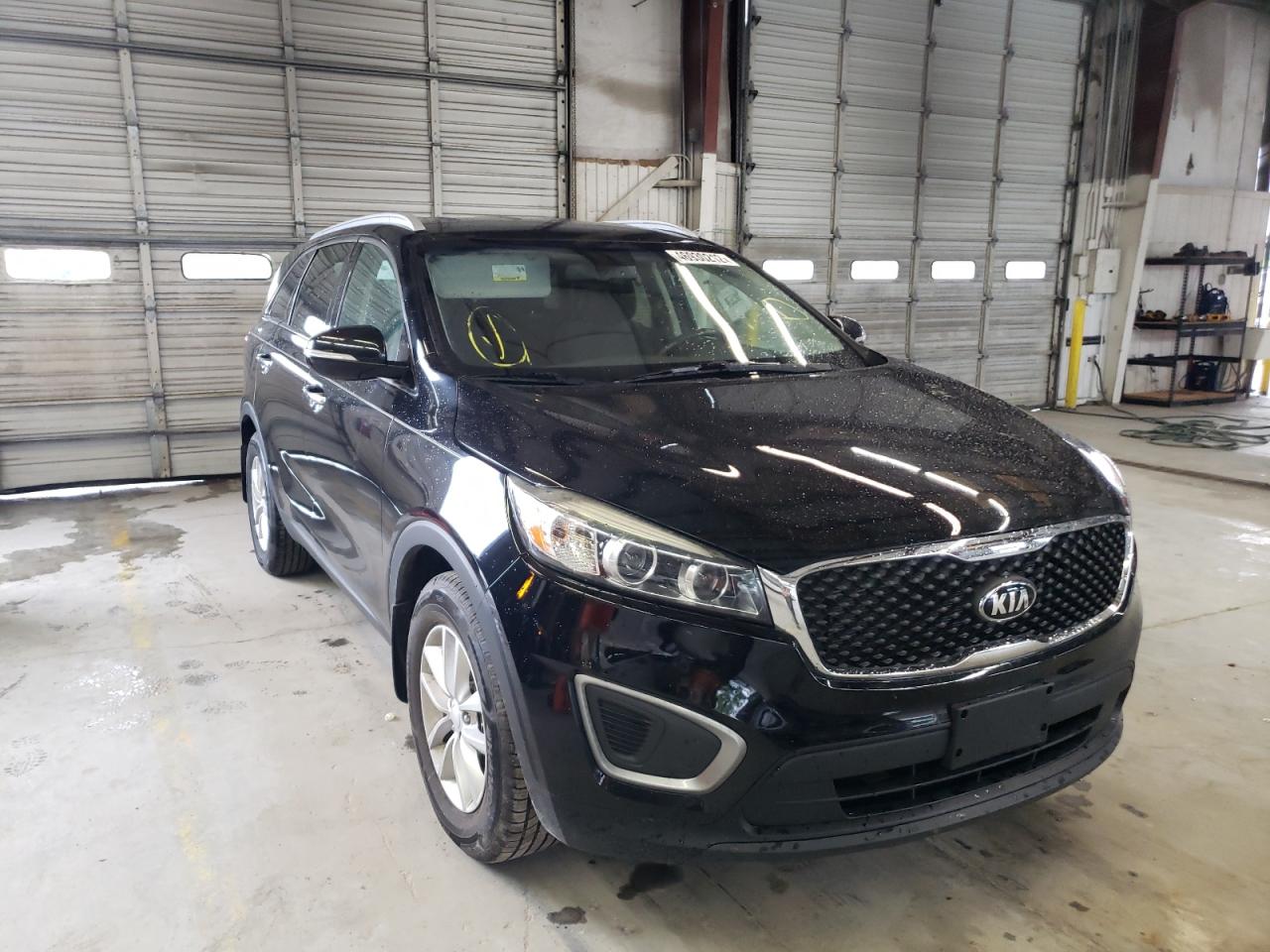 Photo 14 from auction – 2016 KIA SORENTO LX with VIN 5XYPG4A39GG069638