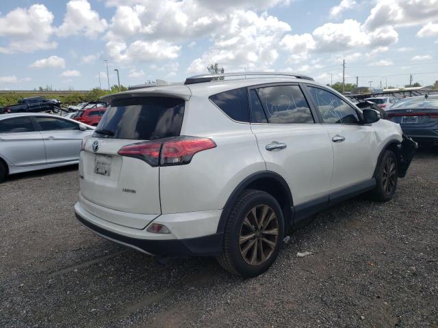 Photo 4 from auction – 2018 TOYOTA RAV4 LIMIT with VIN JTMYFREV4JD120369