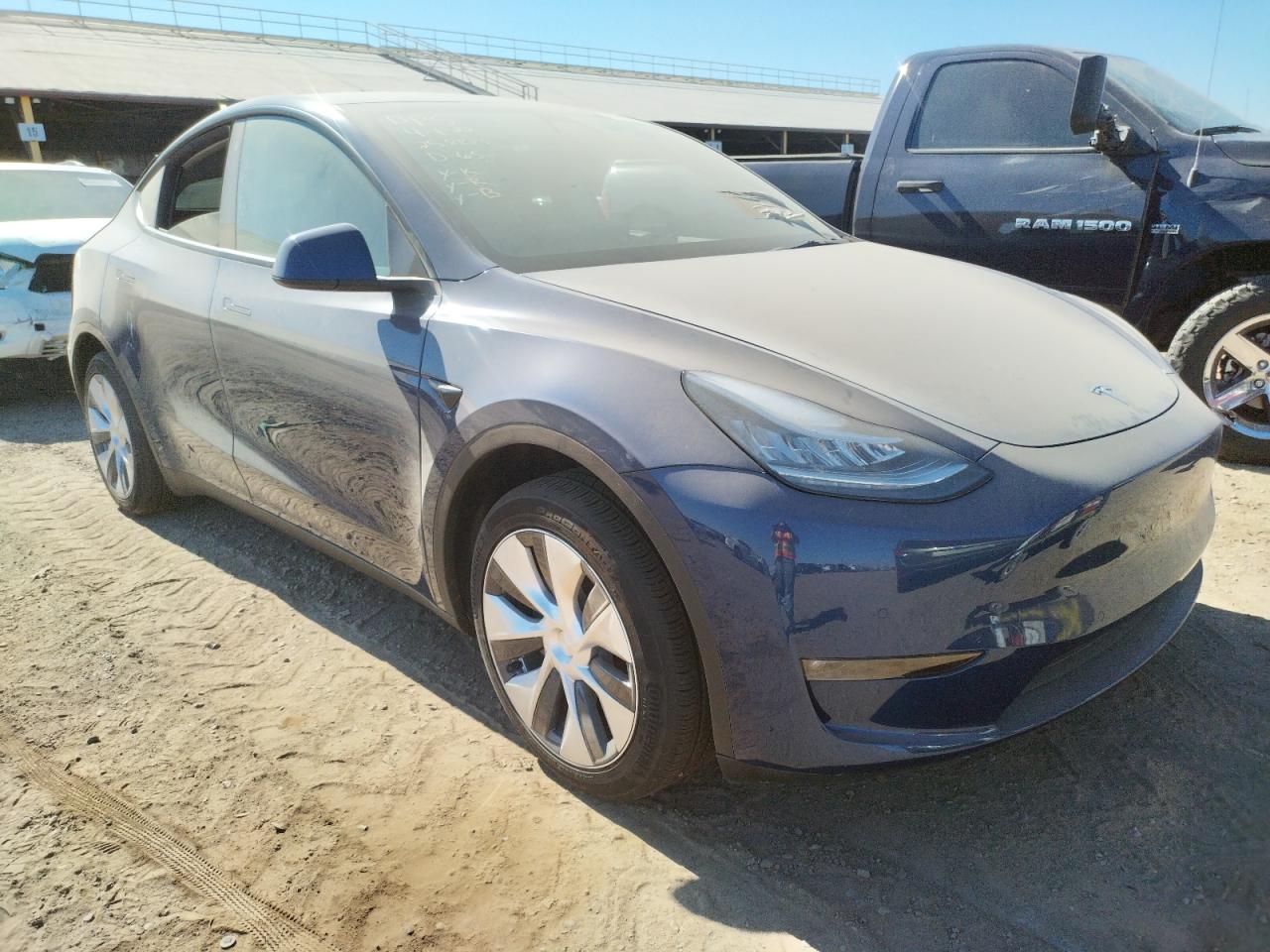 TESLA MODEL Y 2022 with VIN 7SAYGDEE5NF344882 - Photo from auction