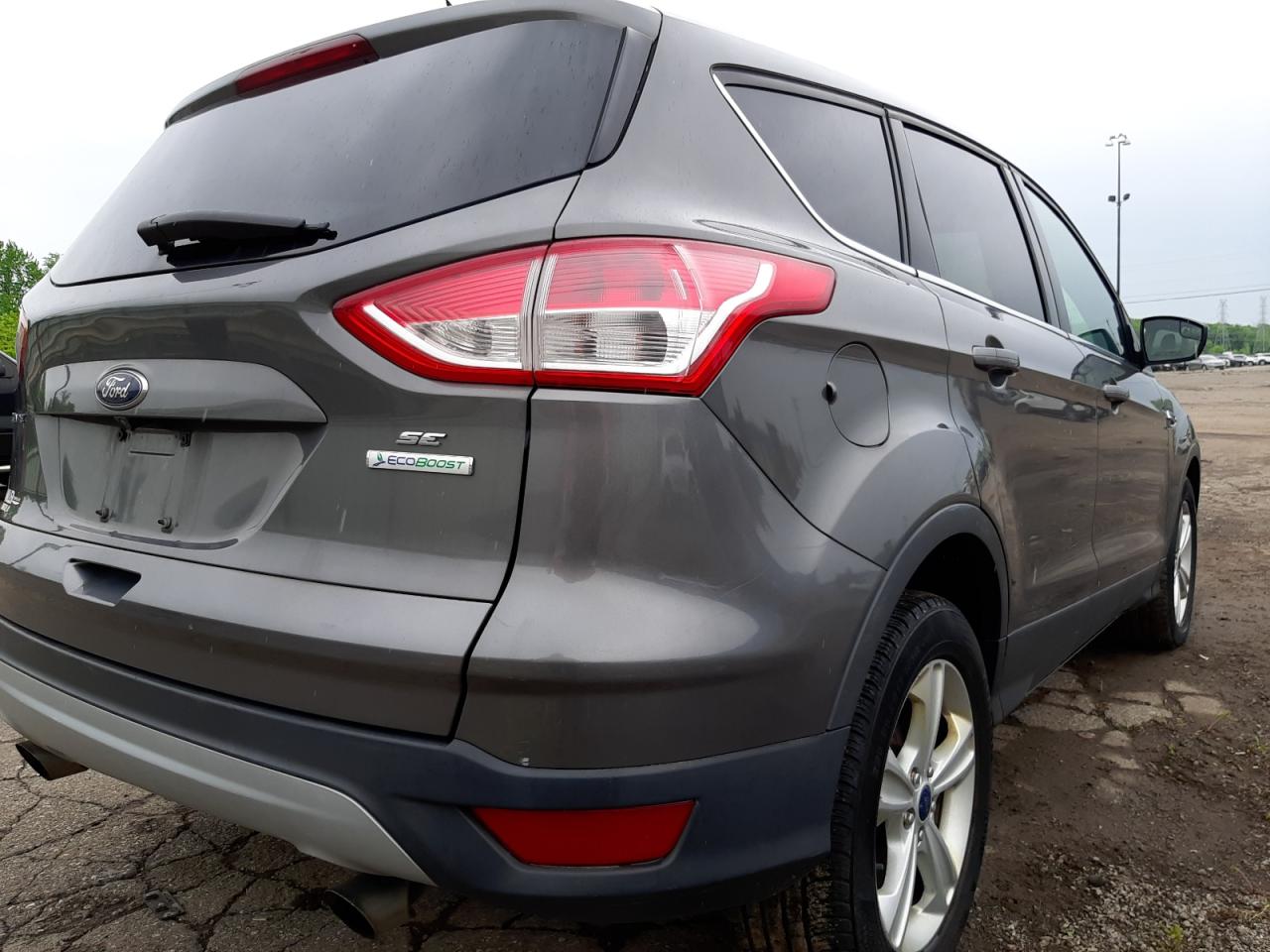 Photo 4 from auction – 2014 FORD ESCAPE SE with VIN 1FMCU0GX4EUB77070