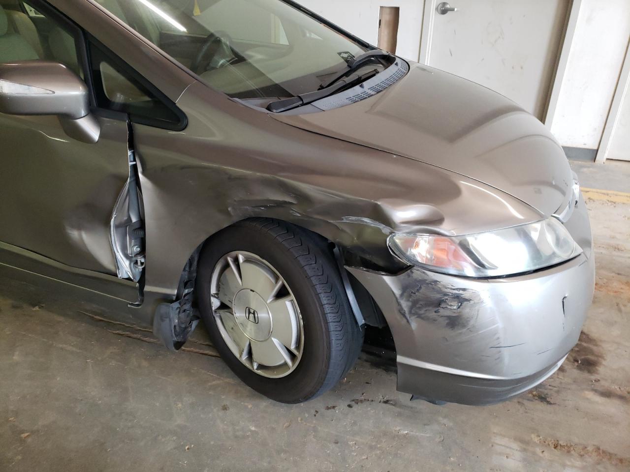 Photo 20 from auction – 2007 HONDA CIVIC HYBR with VIN JHMFA362X7S020125