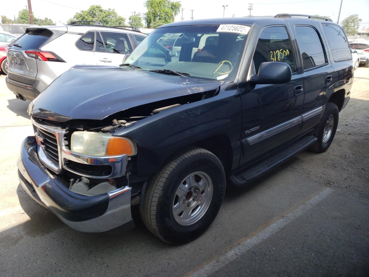 Photo 15 from auction – 2003 GMC YUKON with VIN 1GKEC13T83R149432