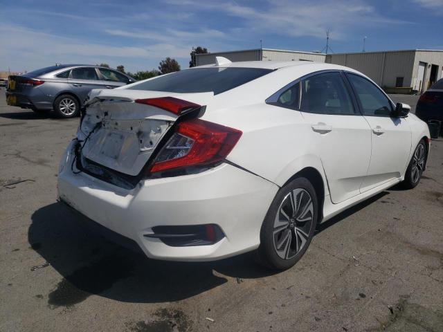 Photo 4 from auction – 2016 HONDA CIVIC EX with VIN 2HGFC1F31GH637740