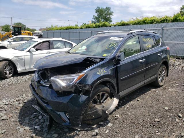 Photo 2 from auction – 2018 TOYOTA RAV4 LIMIT with VIN JTMDFREV2JJ725927