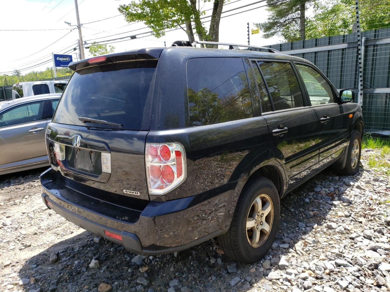 Photo 17 from auction – 2006 HONDA PILOT EX with VIN 2HKYF18536H547766