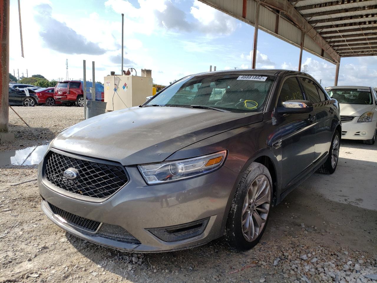 Photo 2 from auction – 2014 FORD TAURUS LIM with VIN 1FAHP2F81EG115525