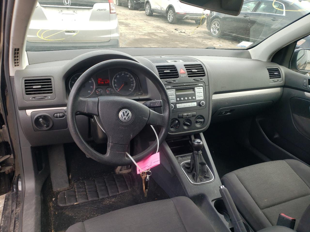 Photo 9 from auction – 2009 VOLKSWAGEN RABBIT with VIN WVWAA71K59W052275