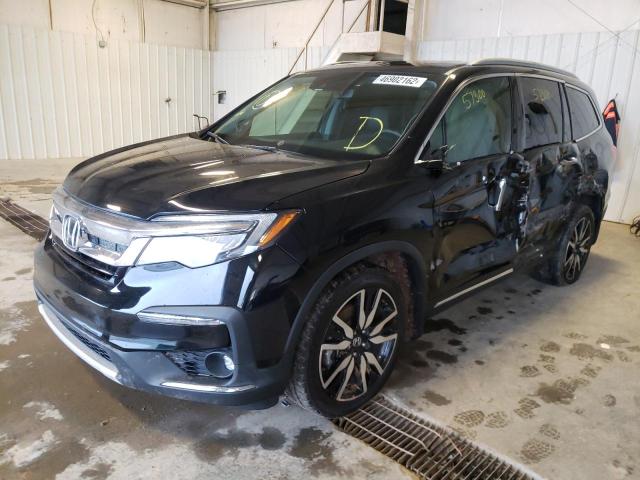 Photo 2 from auction – 2019 HONDA PILOT TOUR with VIN 5FNYF5H69KB043280
