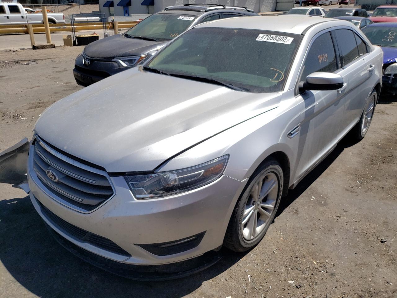 Photo 2 from auction – 2016 FORD TAURUS SEL with VIN 1FAHP2H8XGG104765