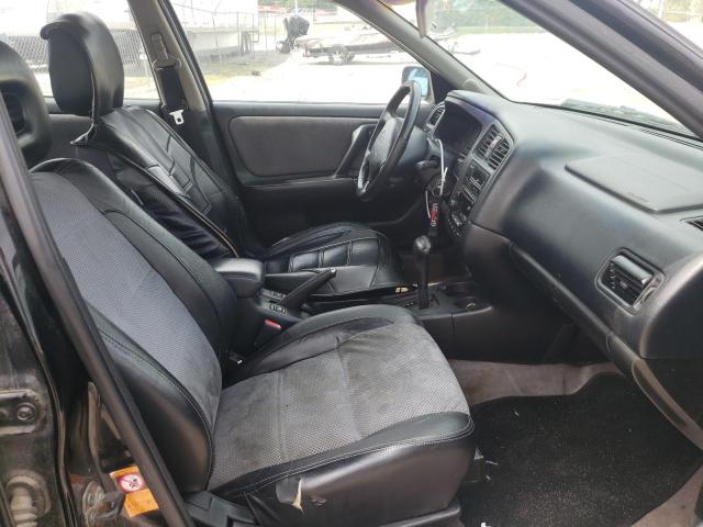 Photo 5 from auction – 2002 INFINITI G20 with VIN JNKCP11A92T508022