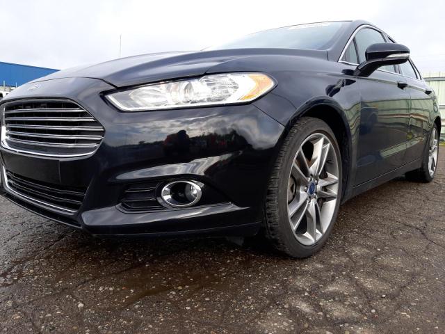 Photo 2 from auction – 2016 FORD FUSION TIT with VIN 3FA6P0D99GR206044