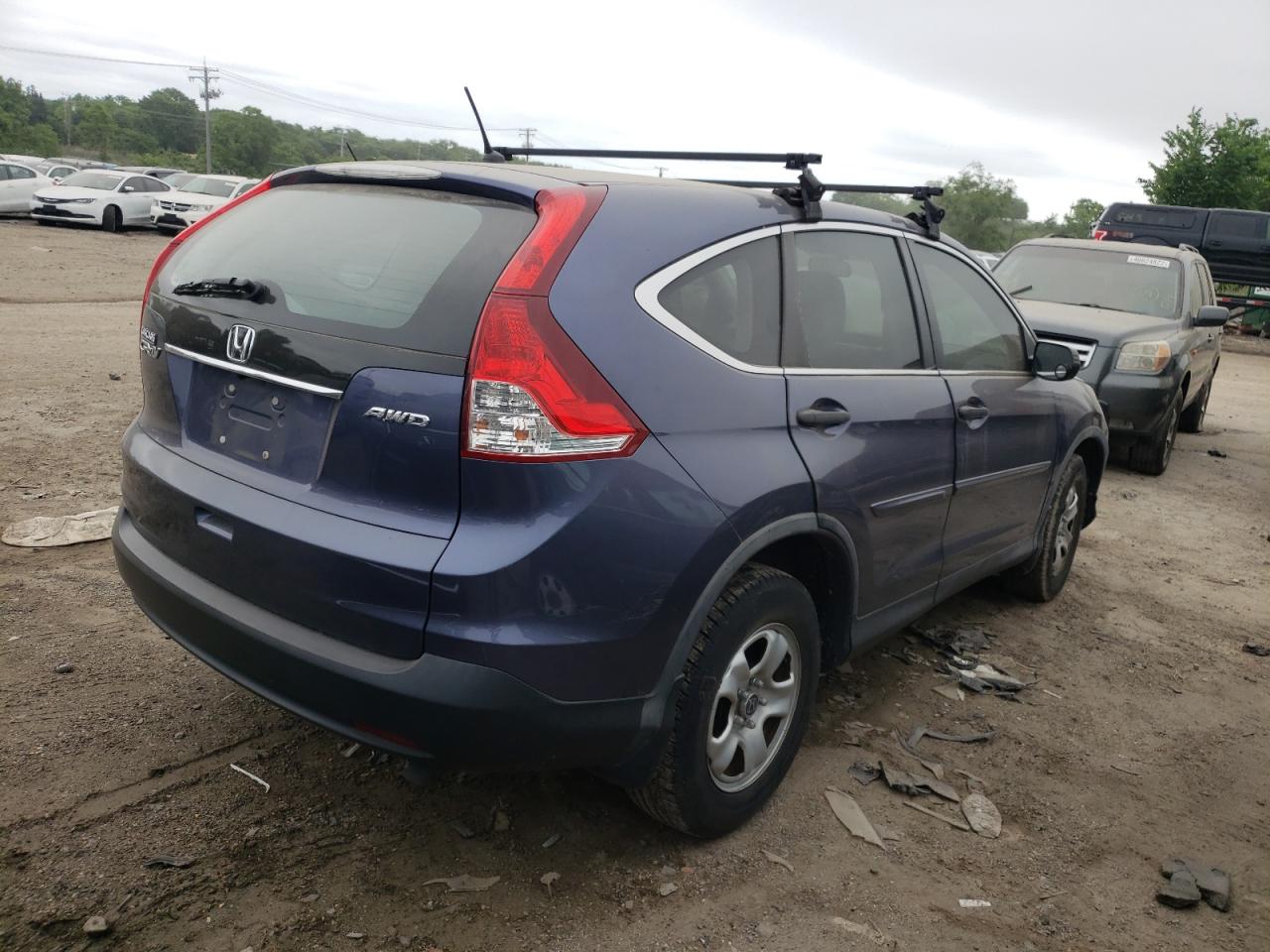 Photo 4 from auction – 2012 HONDA CR-V LX with VIN 5J6RM4H31CL073702