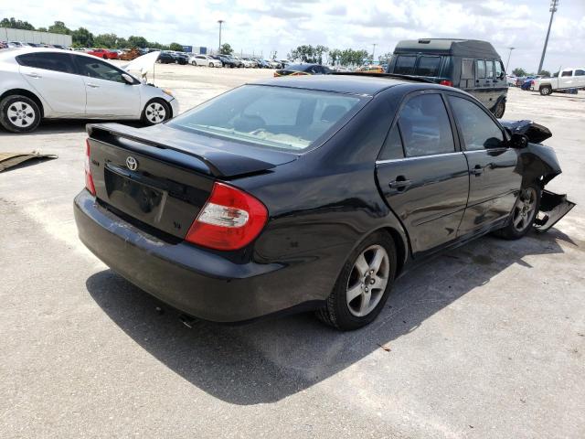 Photo 4 from auction – 2002 TOYOTA CAMRY LE with VIN 4T1BF30KX2U509028