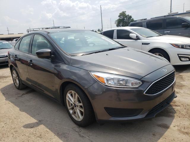 FORD FOCUS SE 2018 with VIN 1FADP3FE8JL319119 - Photo from auction
