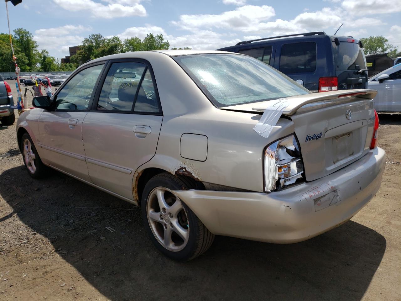 Photo 3 from auction – 2002 MAZDA PROTEGE DX with VIN JM1BJ225320524465