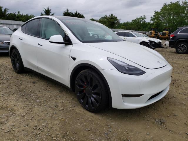 TESLA MODEL Y 2022 with VIN 7SAYGDEF3NF387920 - Photo from auction