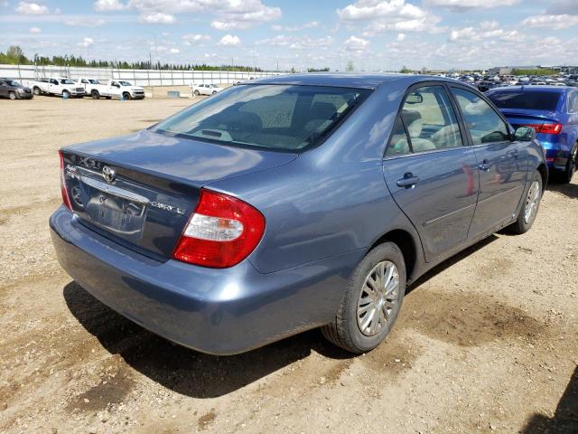 Photo 4 from auction – 2002 TOYOTA CAMRY LE with VIN JTDBE30K820010940