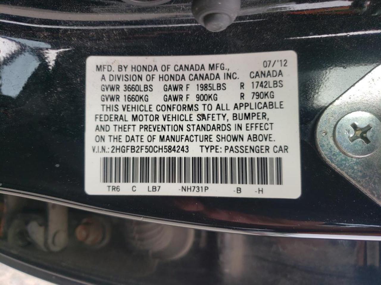 Photo 20 from auction – 2012 HONDA CIVIC LX with VIN 2HGFB2F50CH584243