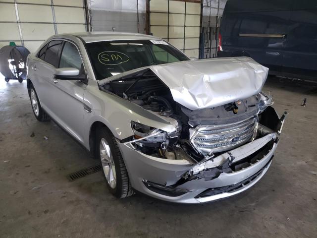FORD TAURUS SEL 2013 with VIN 1FAHP2H8XDG164668 - Photo from auction