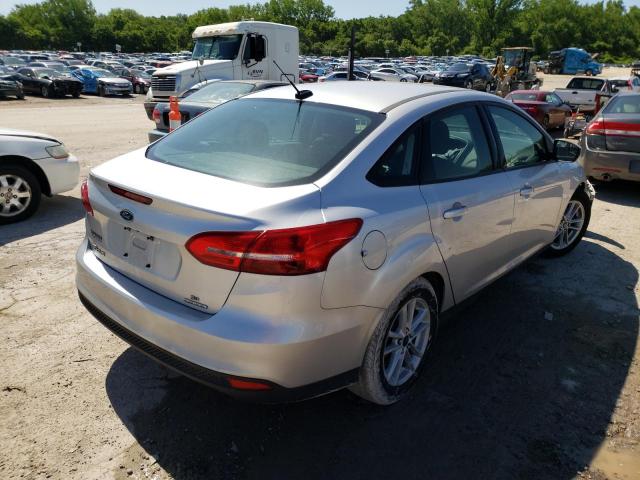 Photo 4 from auction – 2016 FORD FOCUS SE with VIN 1FADP3F21GL235612
