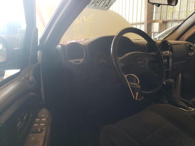 Photo 9 from auction – 2006 GMC ENVOY with VIN 1GKDT13S162211379