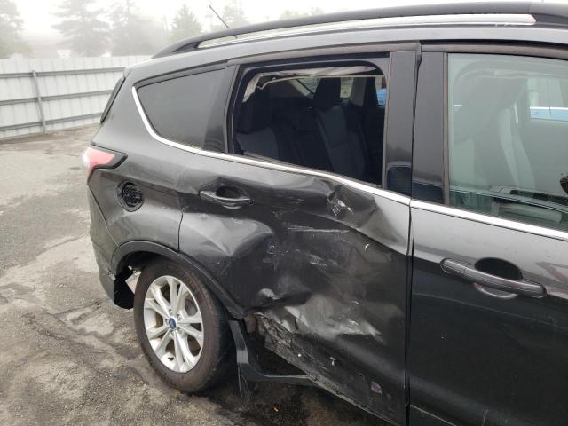 Photo 9 from auction – 2018 FORD ESCAPE SE with VIN 1FMCU9GD0JUD40012