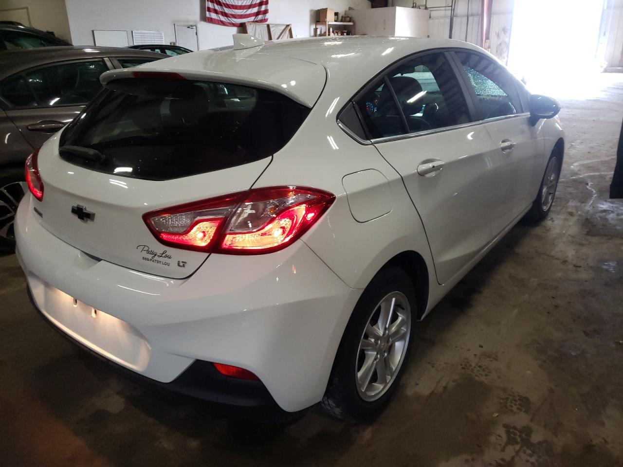 Photo 17 from auction – 2018 CHEVROLET CRUZE LT with VIN 3G1BE6SM7JS565152