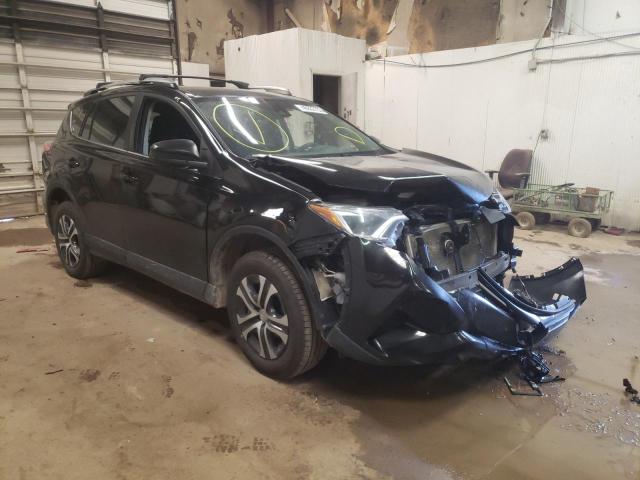TOYOTA RAV4 LE 2017 with VIN 2T3BFREV7HW690398 - Photo from auction