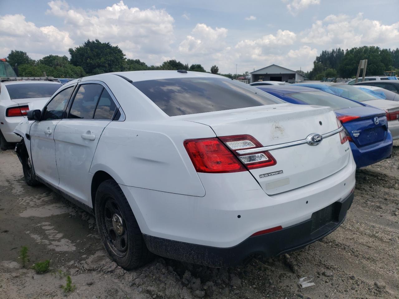 Photo 20 from auction – 2016 FORD TAURUS POL with VIN 1FAHP2MK6GG102447
